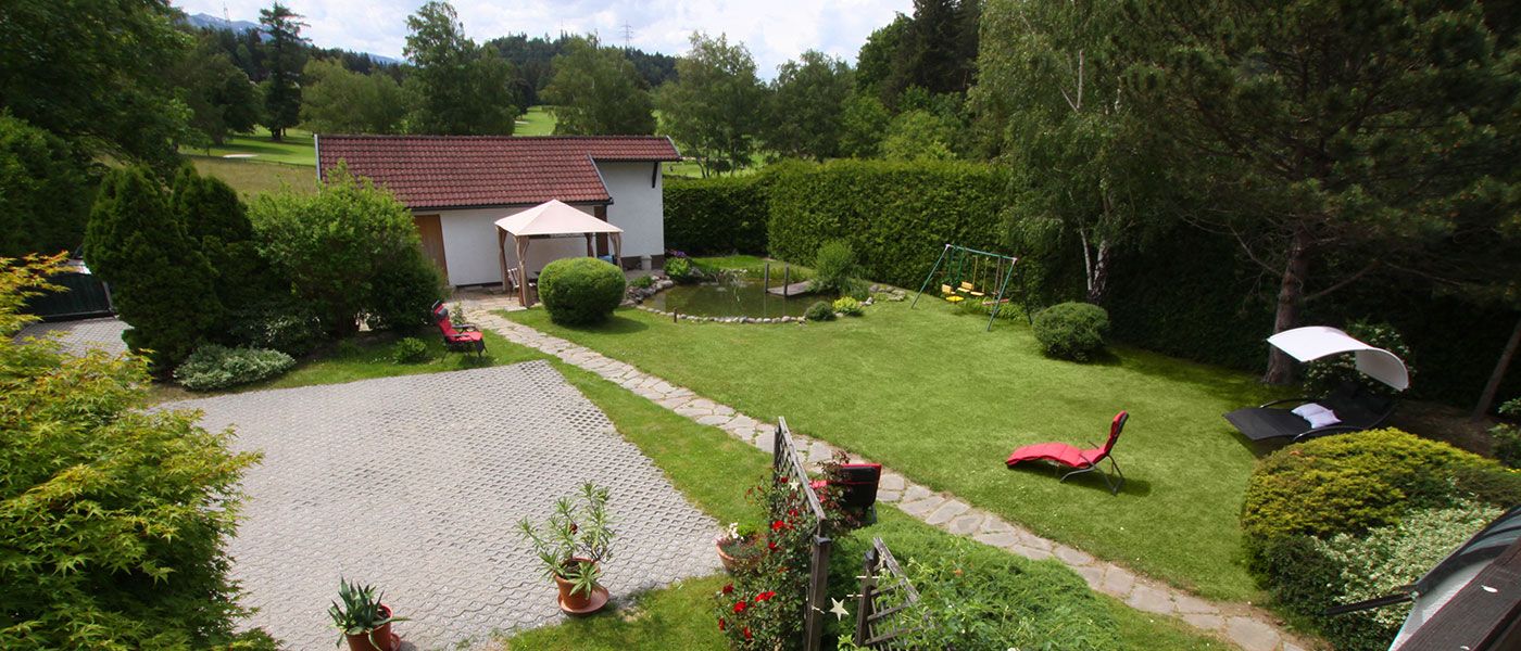 Garten mit Schwimmteich vom Appartements Wessely Lans, Lanser See, Sommer, Golfen in Lans